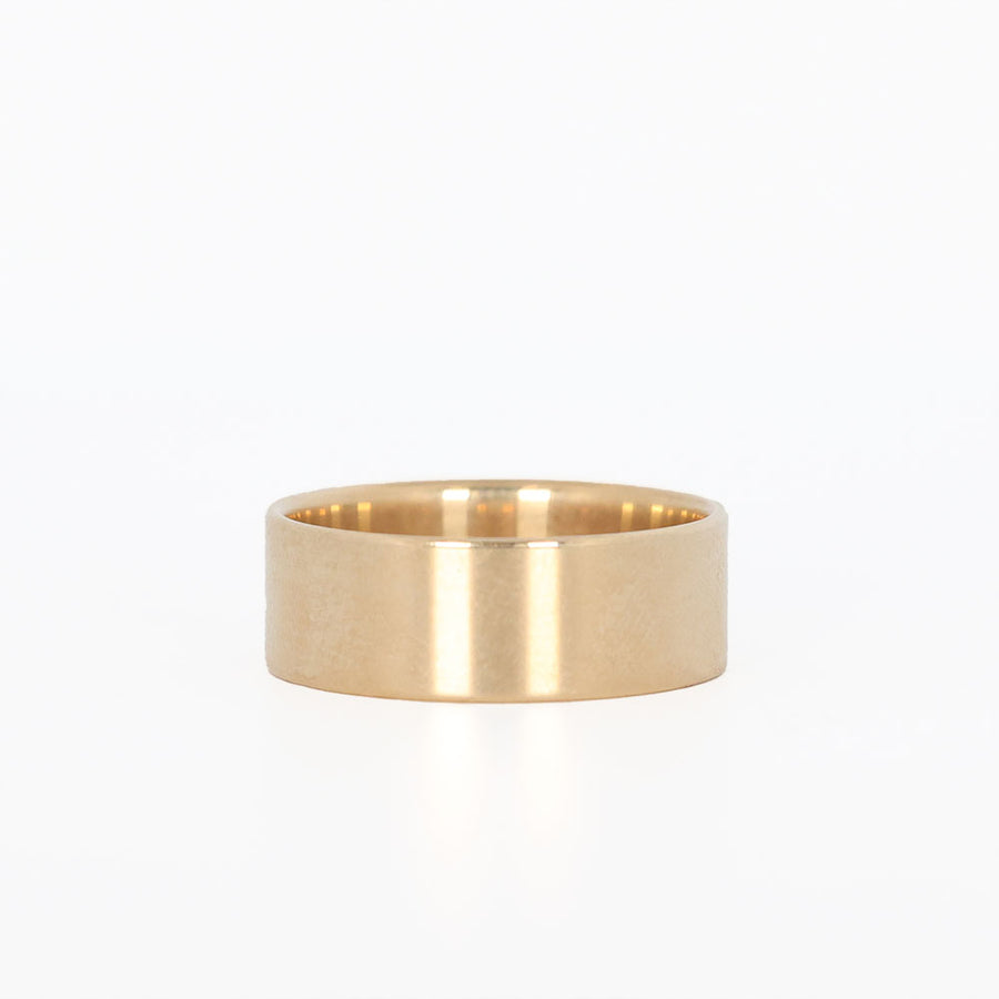 Men's Gold Wedding Ring Laying Flat