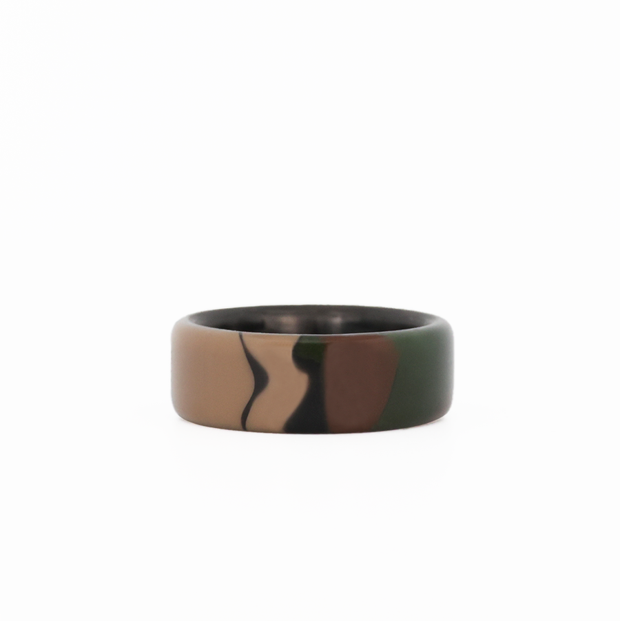 camo ring with carbon fiber sleeve laying flat