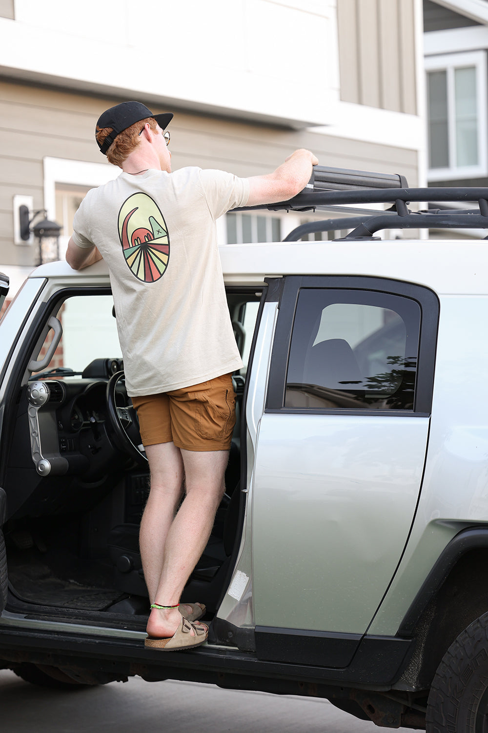 Model with Armadillo Shirt Tee Working on Car
