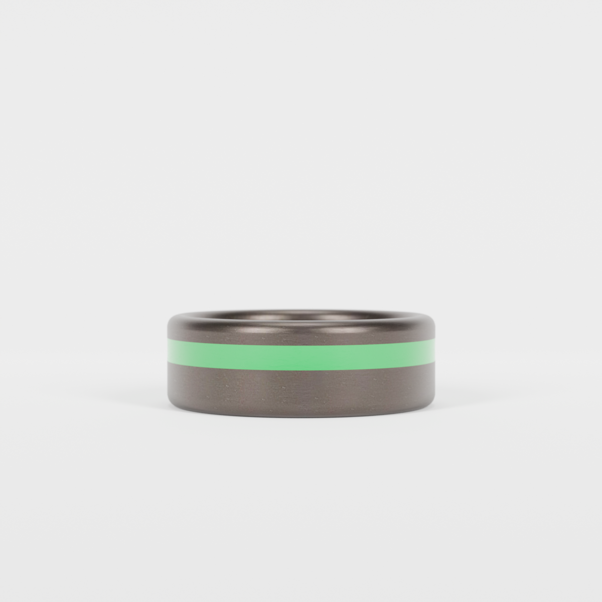 Brushed Tantalum Thin Green Line Ring Laying Flat