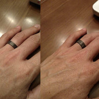 Carbon Ring Set Worn On A Table
