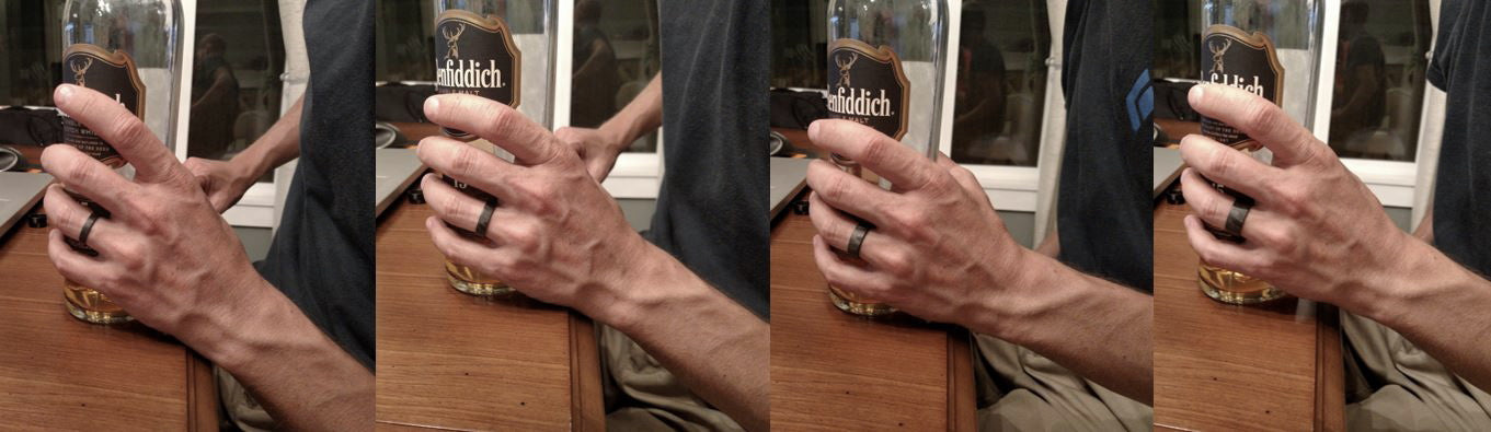 Carbon Ring Set Worn On A Man's Finger