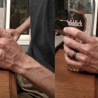 Carbon Ring Set Worn On A Man's Finger