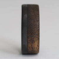 70/30 walnut wood ring with carbon fiber sleeve front view close up