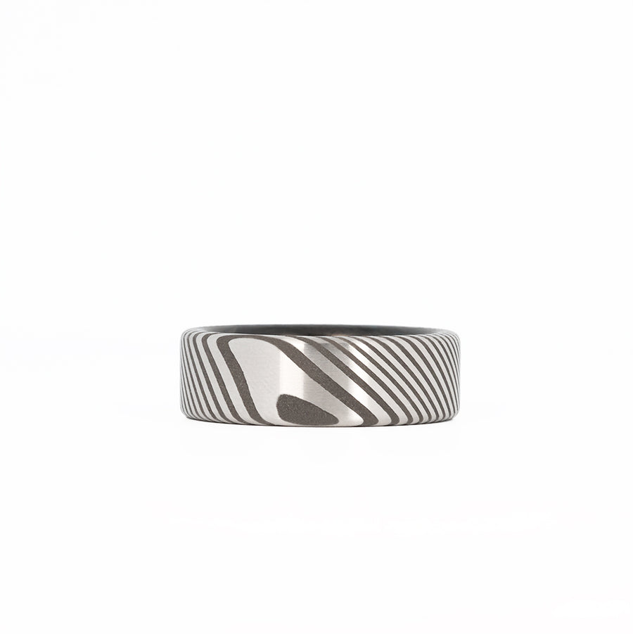 Damascus Men's Wedding Ring with Forged Carbon Fiber Interior Laying Flat