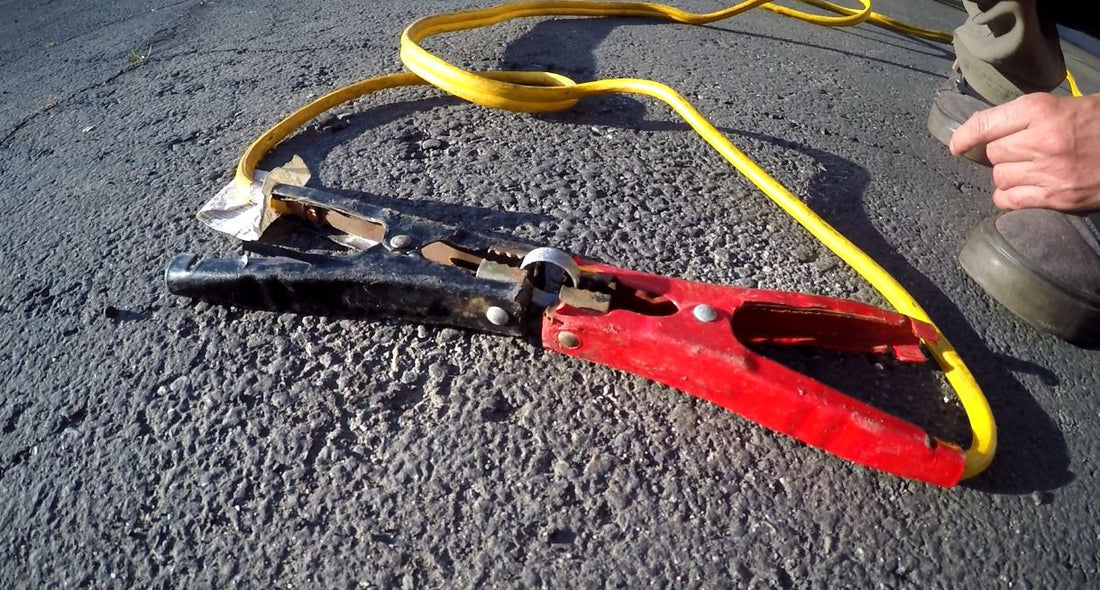 non conductive wedding ring hooked up to a car battery showing that it is non conductive