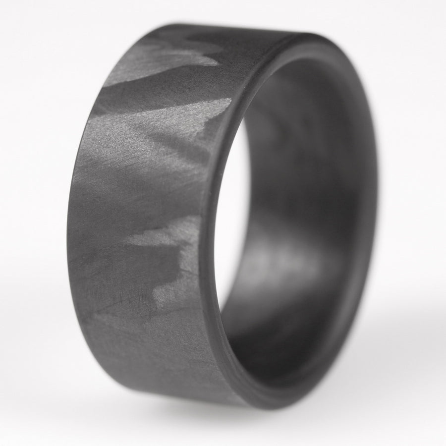men's carbon fiber wedding ring closeup