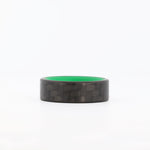 Carbon Fiber Green Glow Ring Laying Flat