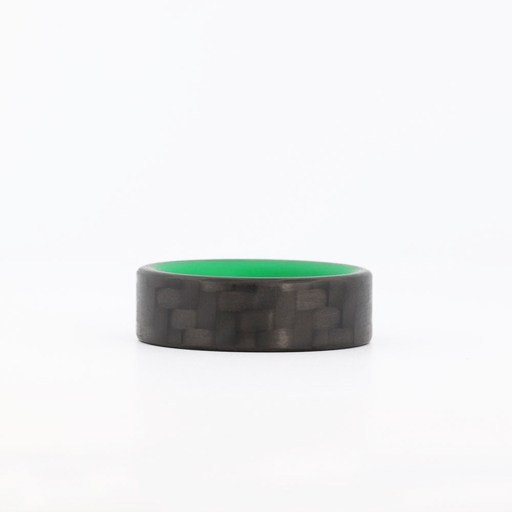 Carbon Fiber Green Glow Ring Laying Flat