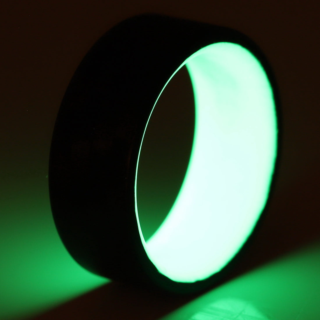 Carbon Fiber Green Glow Ring Glowing Close Up