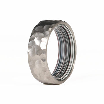 Fordite Ring with Hammered Titanium Exterior