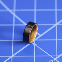 Top angle shot of Whiskey Barrel Wedding Ring with Carbon Fiber Exterior