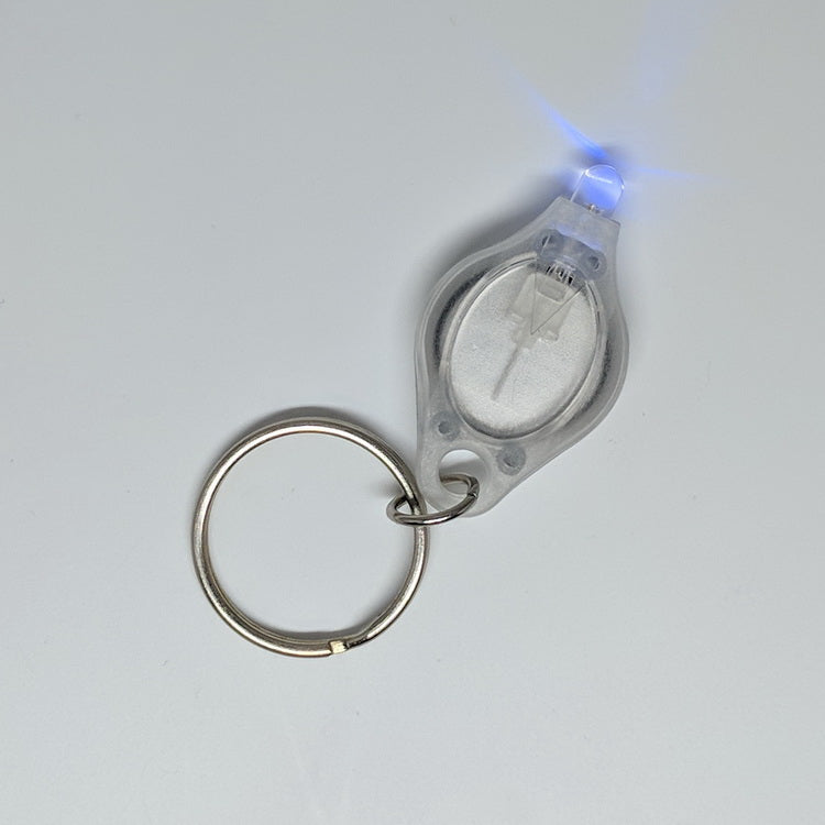 A micro uv key chain light on a table