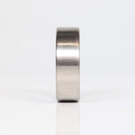 Fordite Wedding Ring with Titanium Exterior Front View