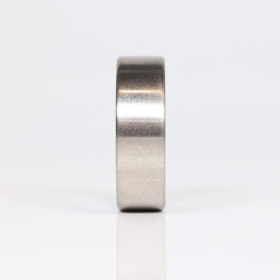 Fordite Wedding Ring with Titanium Exterior Front View