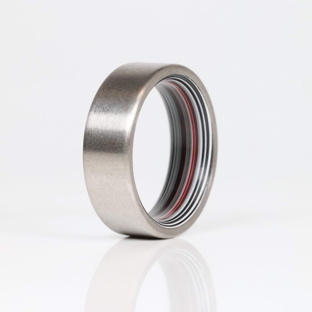 Fordite Wedding Ring with Titanium Exterior