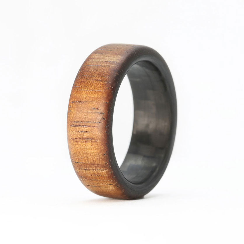 koa wood ring with carbon fiber sleeve