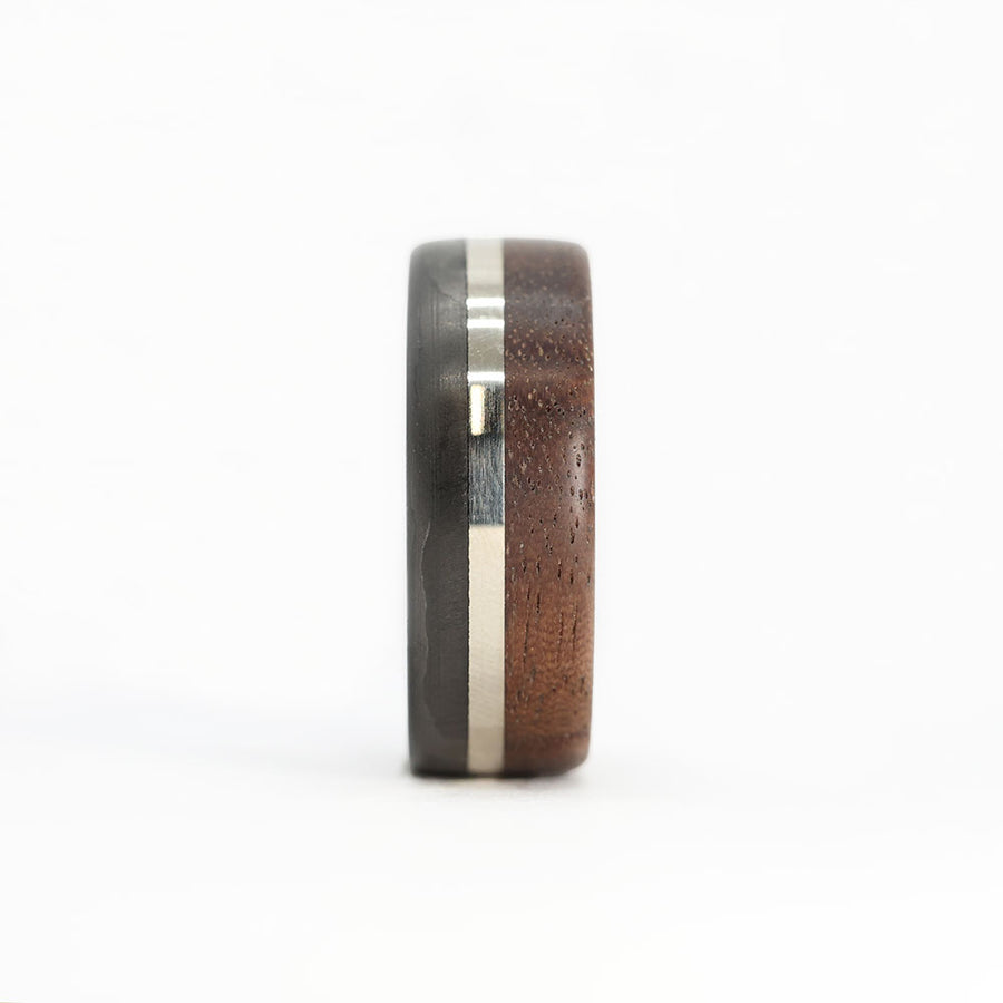 walnut wood and 14 karat white gold wedding ring with carbon fiber sleeve front view