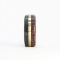 walnut wood and 14 karat yellow gold wedding ring with carbon fiber sleeve front view