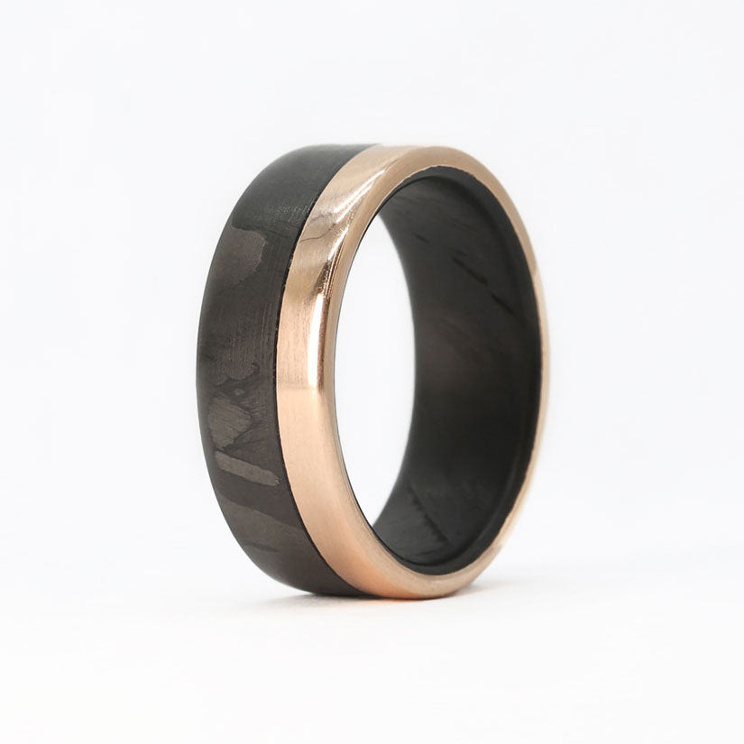 carbon fiber wedding band with rose gold rail