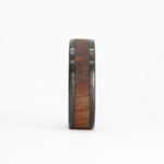 men's koa wood ring with carbon fiber rails and titanium sleeve front view