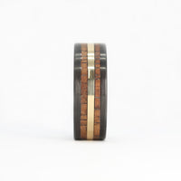 hawaiian koa wood ring with a gold inlay and carbon fiber sleeve front view