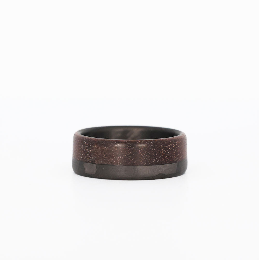 70/30 walnut wood ring with carbon fiber sleeve laying flat