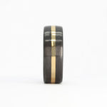 carbon fiber men's wedding ring with yellow gold band front view