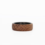 whiskey barrel ring with carbon fiber sleeve laying flat