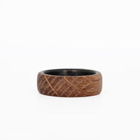 whiskey barrel ring with carbon fiber sleeve laying flat
