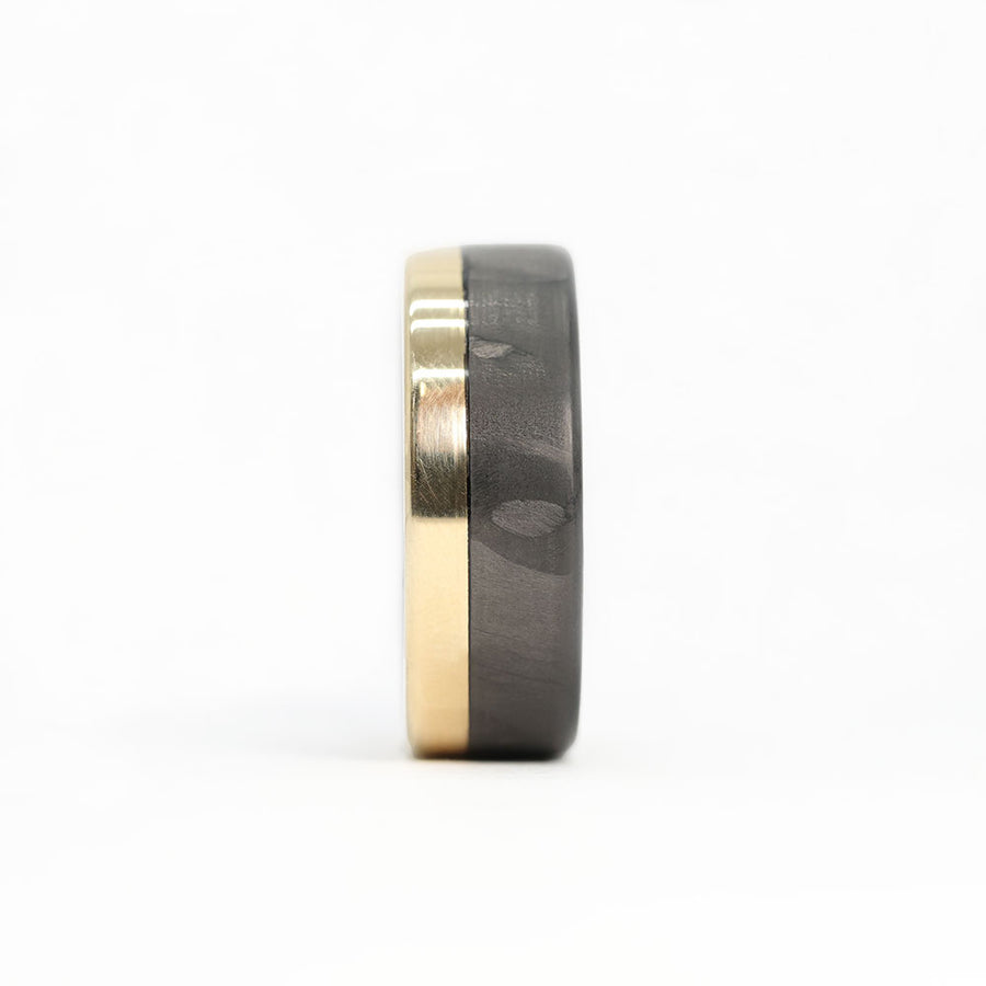 Men's carbon fiber ring with yellow gold band front view