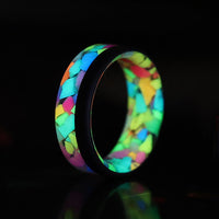 pride glow in the dark ring with black carbon fiber rail glowing