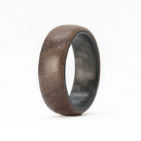 walnut wooden wedding ring with carbon fiber sleeve