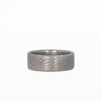 Damascus Ring Laying Flat