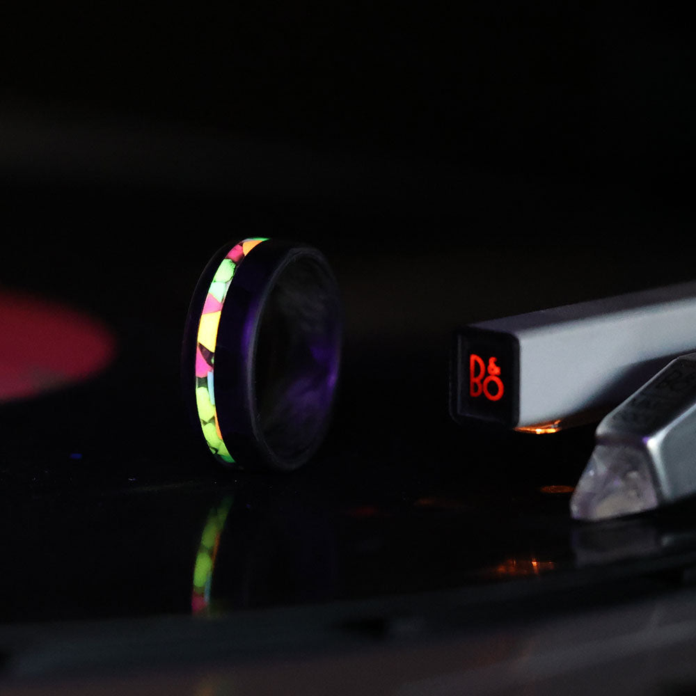 Glow Wedding Ring Glowing On Vinyl Record Player