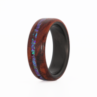 cocobolo wood ring with purple opal inlay and carbon fiber sleeve