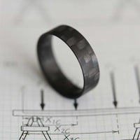 Carbon Fiber Ultralight Ring On Paper
