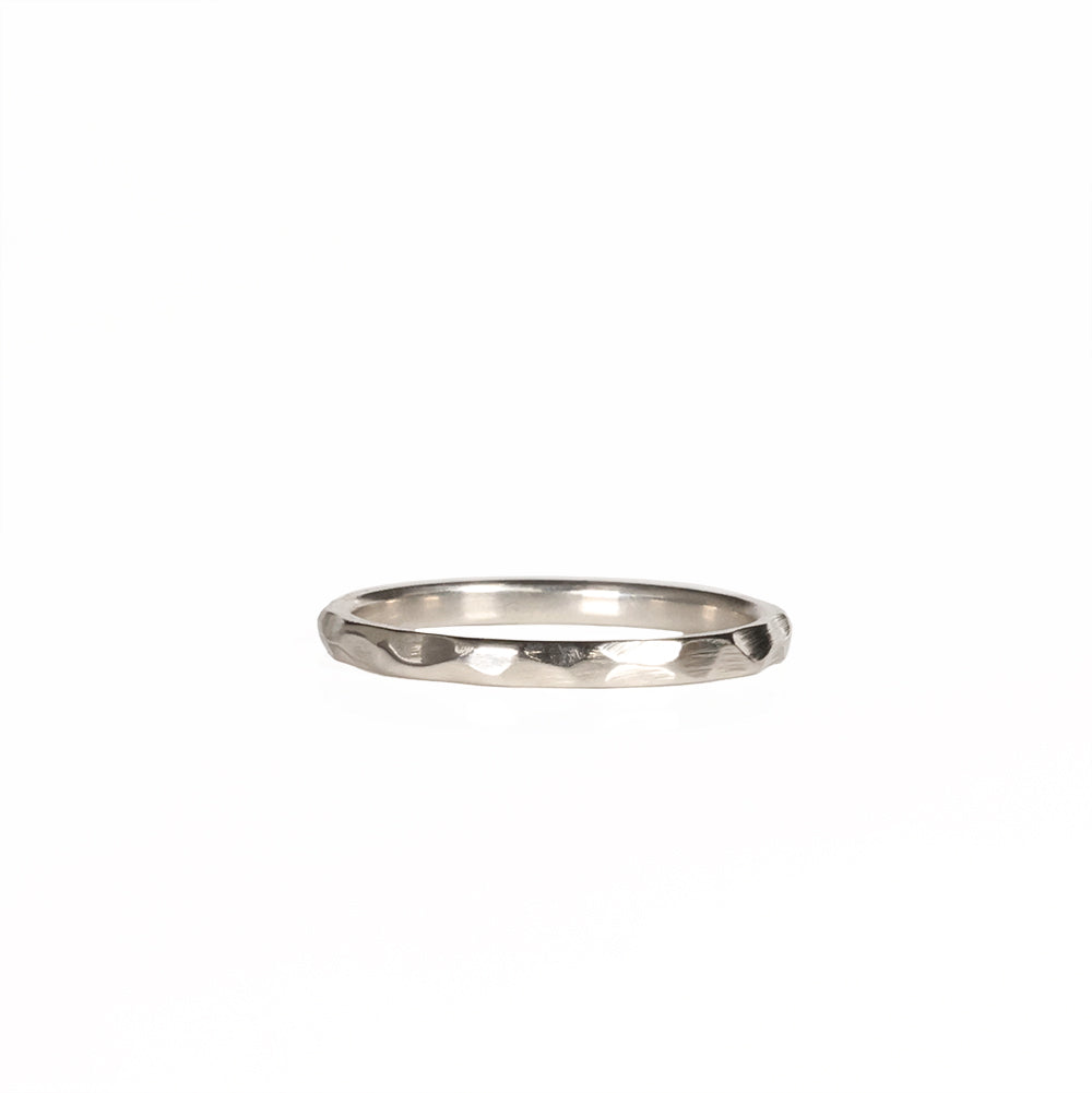 Stackable Hammered White Gold Ring Laying Flat