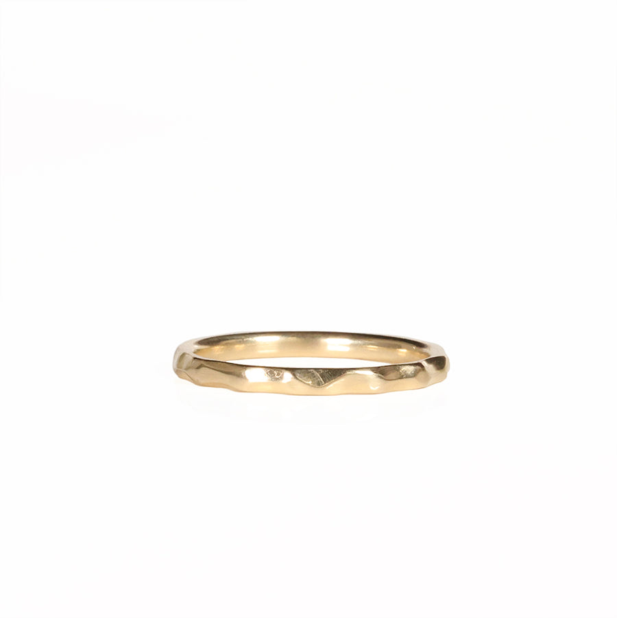 Stackable Hammered Gold Ring Laying Flat