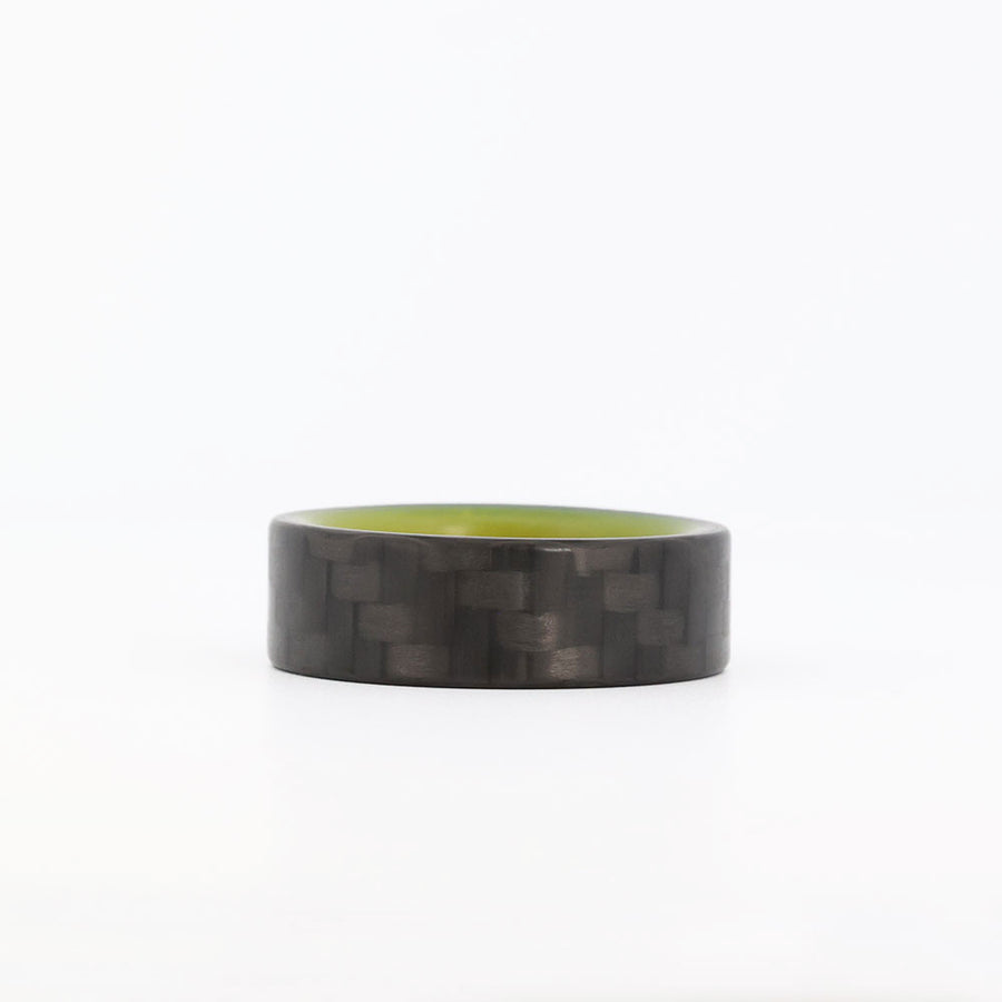 Yellow Glowing Resin Ring with Carbon Fiber laying flat